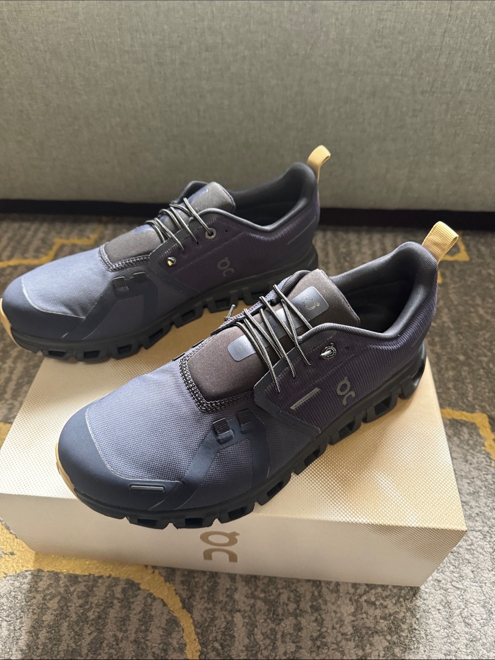 On Running Men's Athletic Shoe in Navy with Tan Heel Tab
